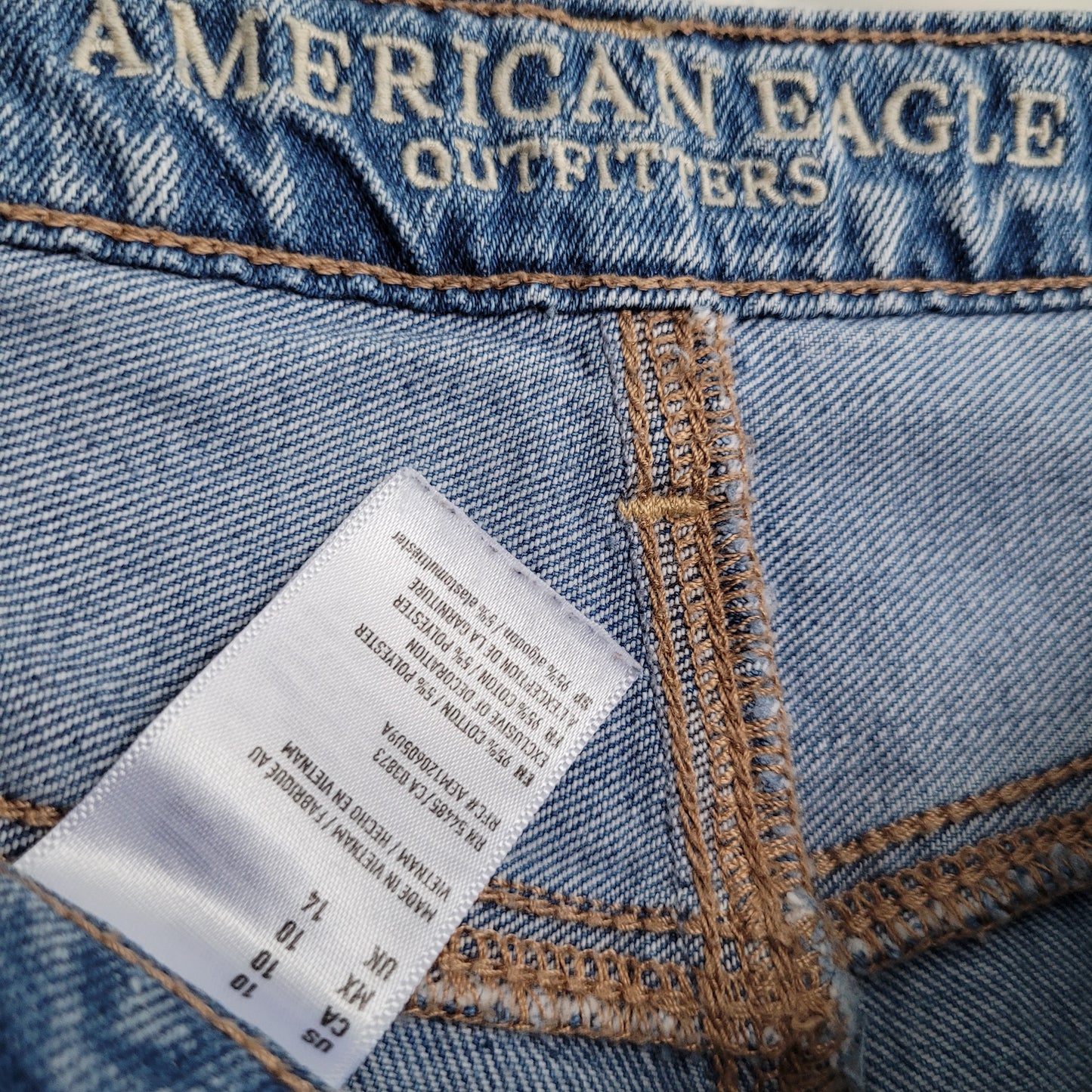 Light Wash Distressed Denim Shorts - Ameridan Eagle (Size 10)