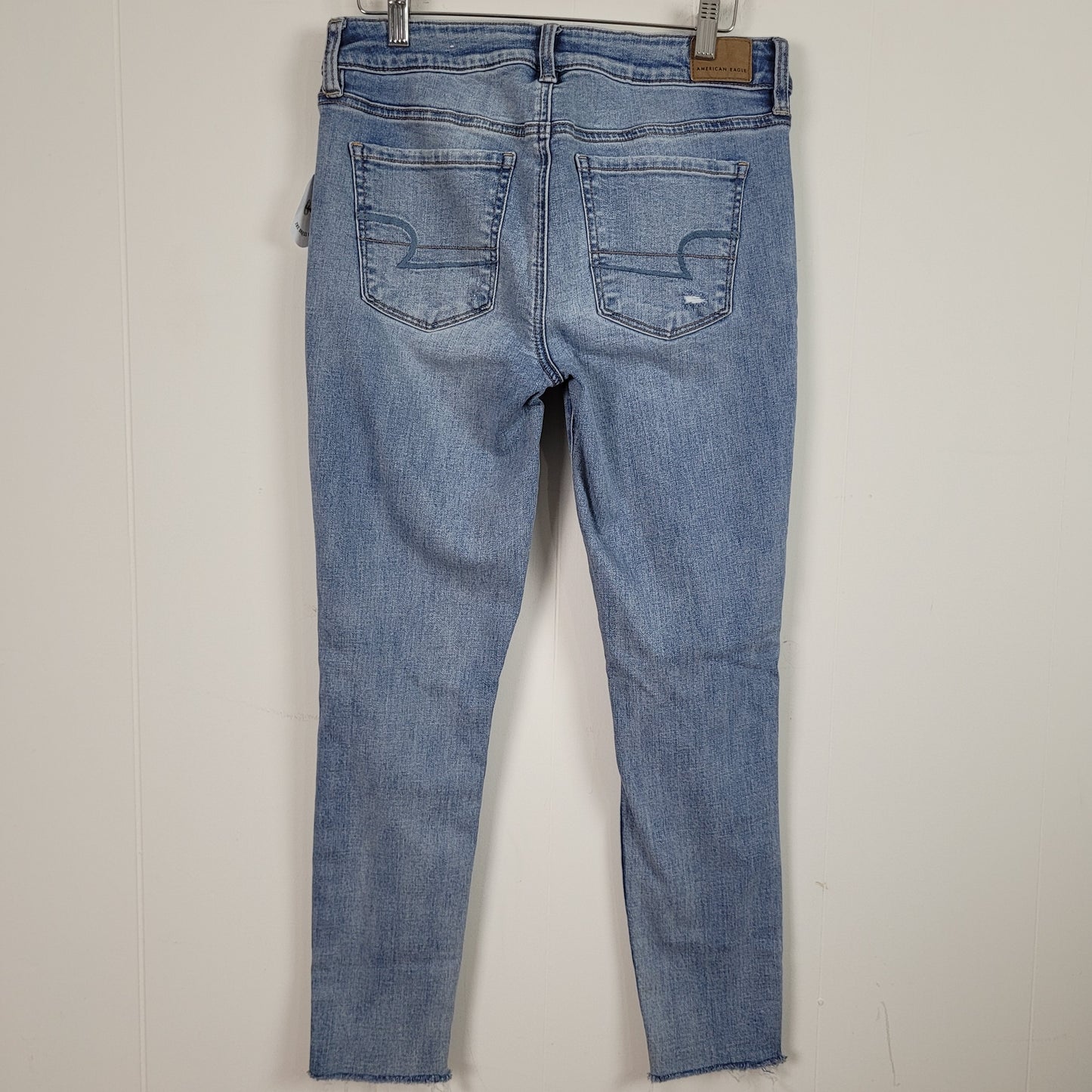 Light Wash Super Stretch Distressed Jegging Jeans - American Eagle (Size 8 Short)
