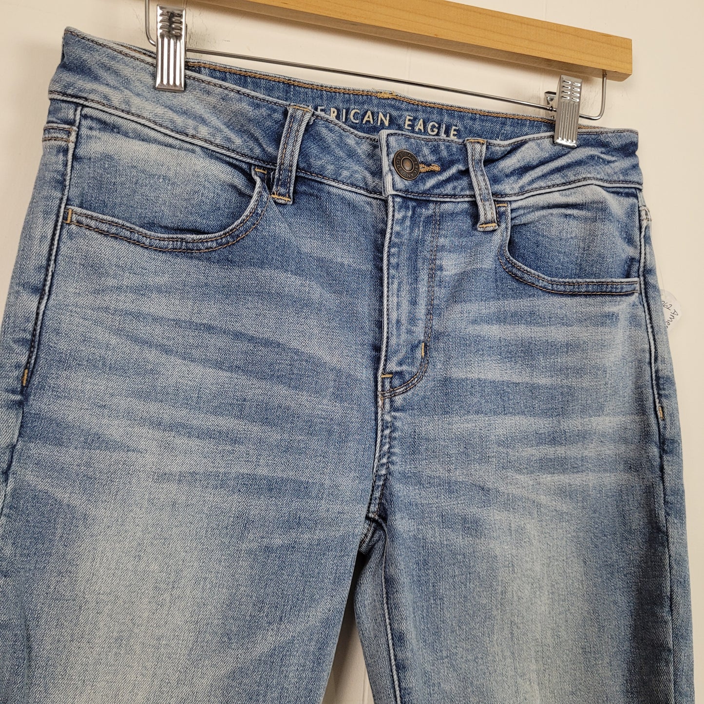 Light Wash Super Stretch Distressed Jegging Jeans - American Eagle (Size 8 Short)